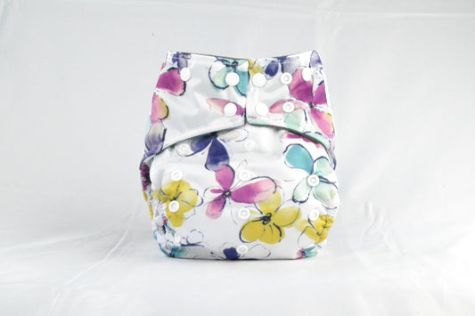 white cloth diaper with multi color flowers